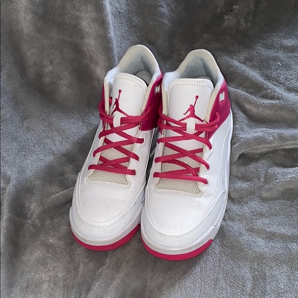pink and white jordan flights